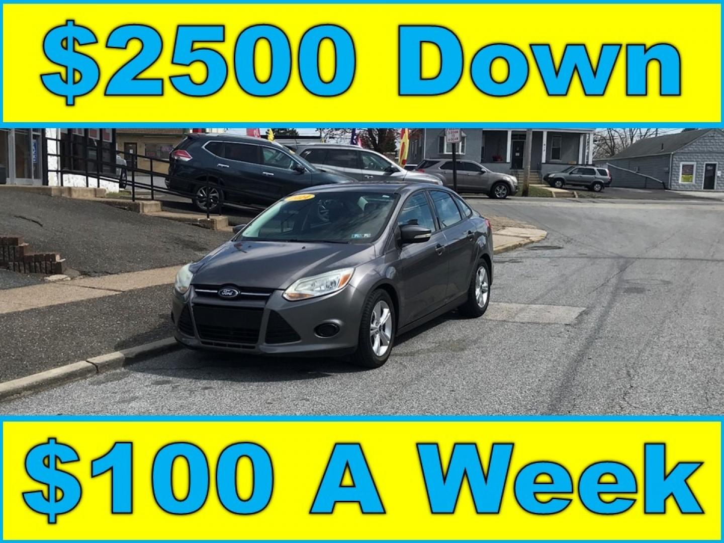 2014 Gray /Gray Ford Focus (1FADP3F23EL) with an 2.0 engine, Automatic transmission, located at 577 Chester Pike, Prospect Park, PA, 19076, (610) 237-1015, 39.886154, -75.302338 - Photo#0